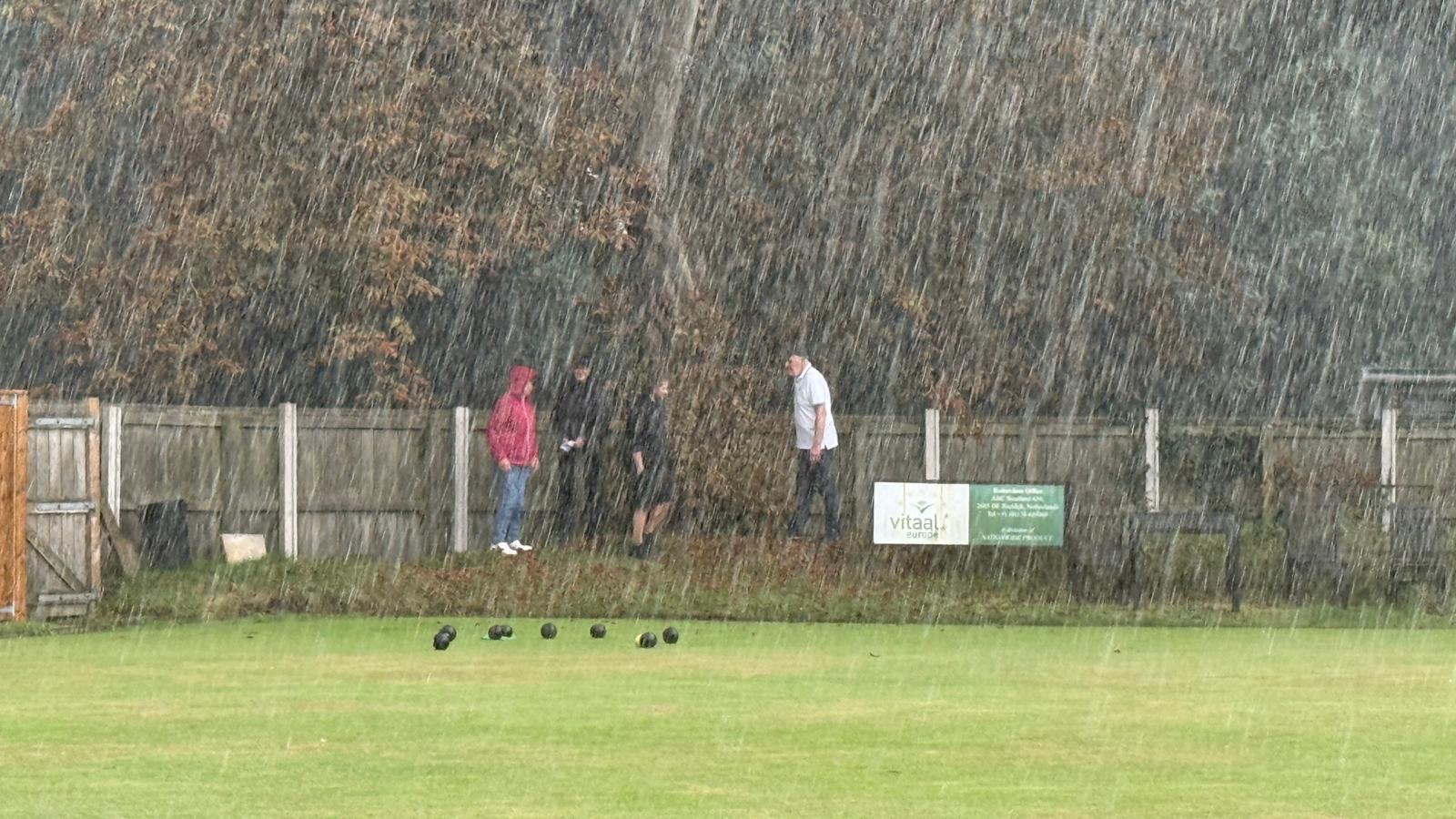 Heavy rain sweeping across the bowling green during Derek’s 12-hour bowls marathon
